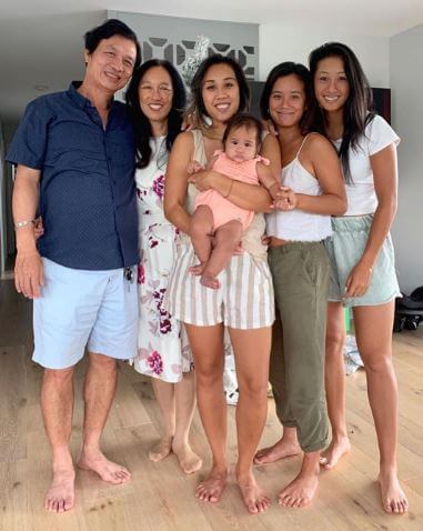 Priscilla Hon with her family.